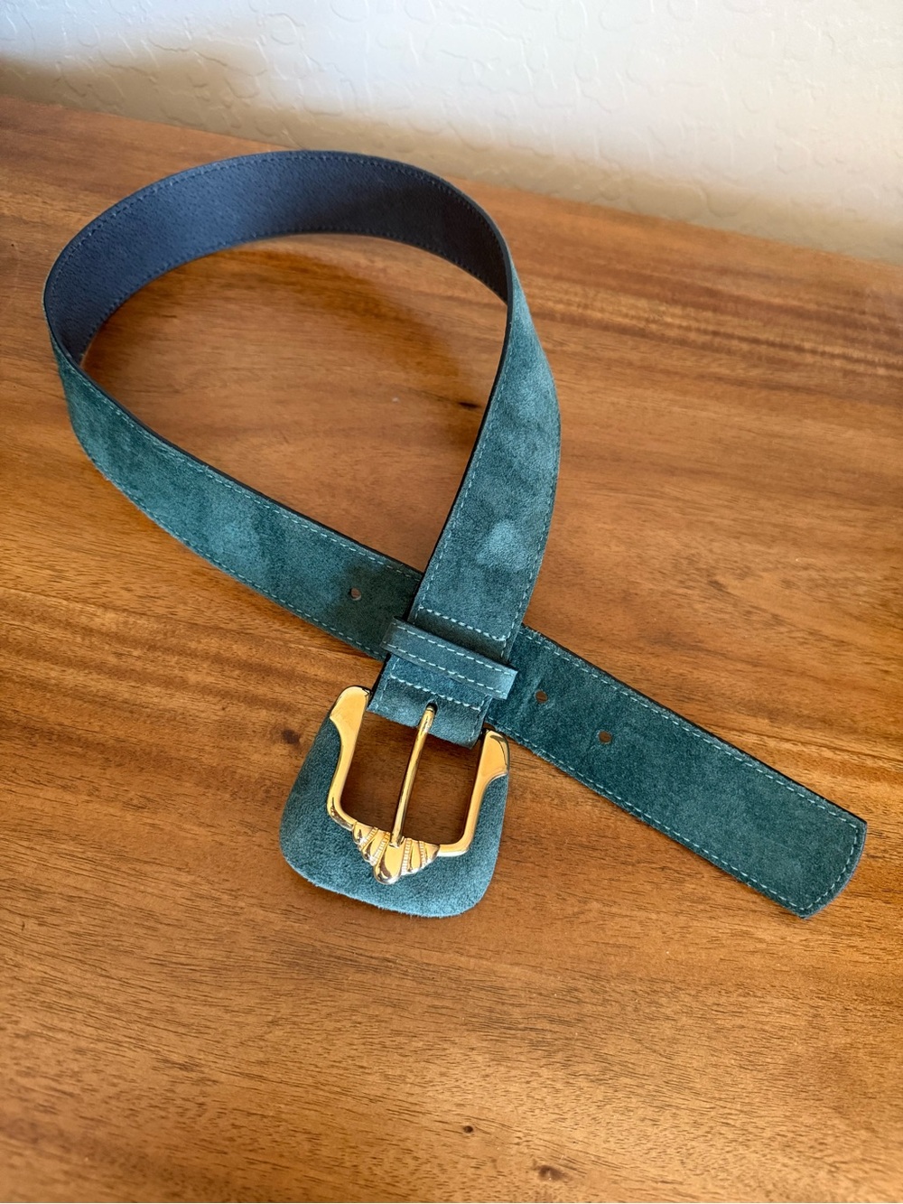 Vintage green suede Kudos belt with the uniquely shaped gold buckle, small